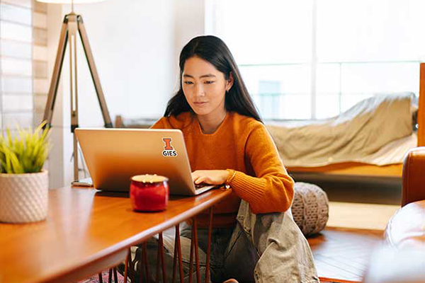 Student on laptop at home