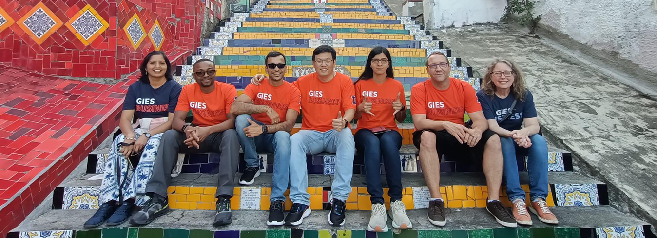 Immersion group sitting on stairs in Brazil